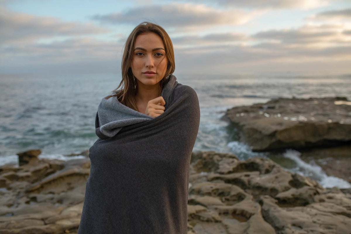 This super cozy blanket offers all the benefits of our cozy sweatshirts and hoodies. Whether you are watching your favorite show on the couch, tailgating at the game, or watching the sunset on the beach, this ultra soft blanket provides the ultimate way to stay warm and cozy.